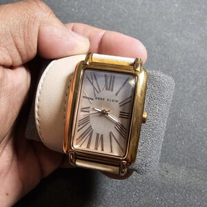 Anne Klein AK1192 Pink Tone Wrap Around Band Ladies Quartz Tank Watch Working sh